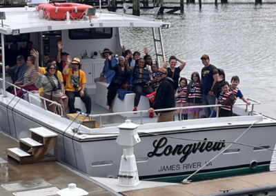 Students on a MWEE field trip on the James River