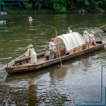 A traditional James River Batteau boat representing Virginia's river history.