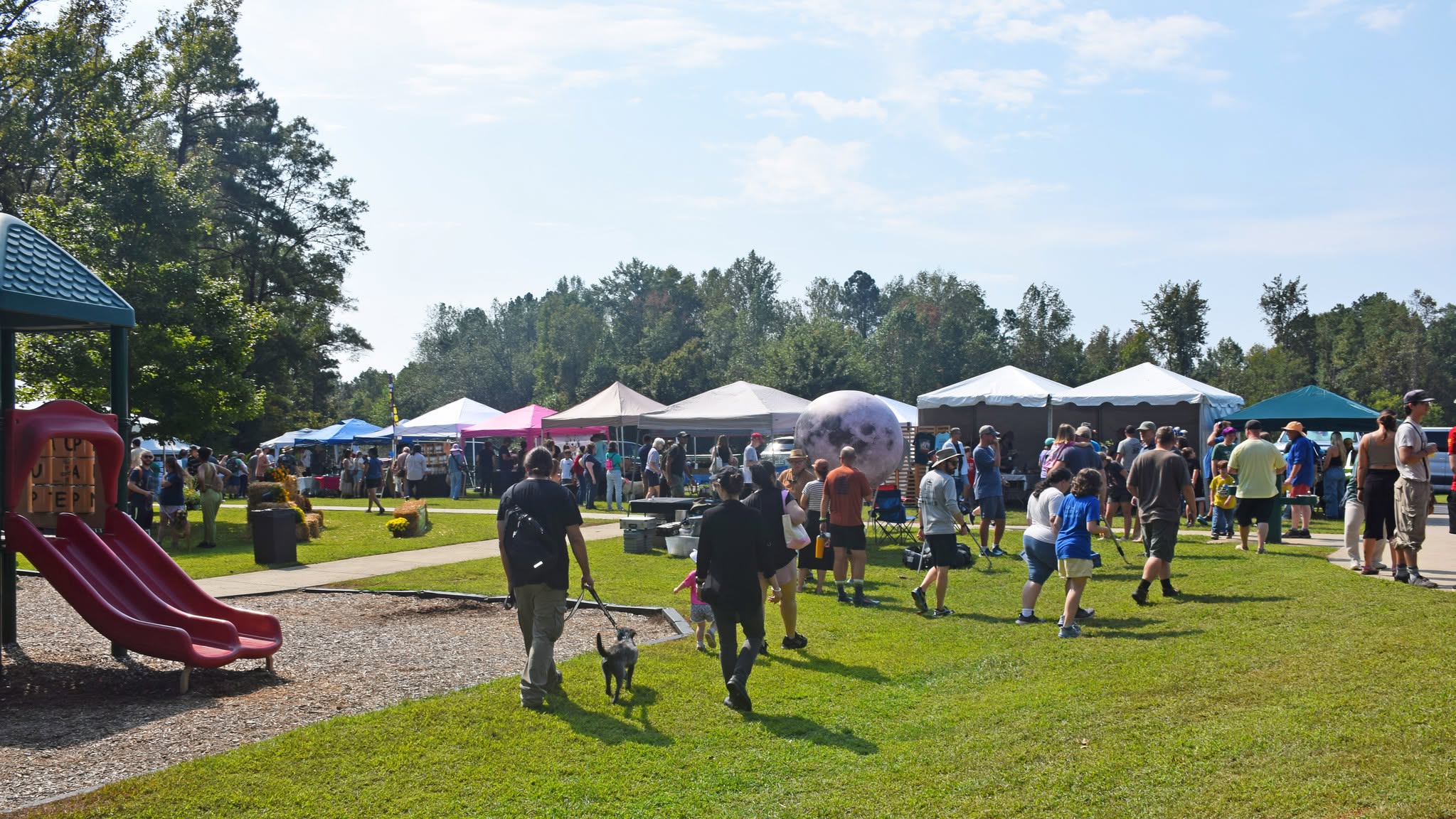 Vendors set up at the PawPaw Festival